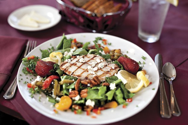 Morgan’s Signature Salad is grilled chicken served atop Romaine lettuce with candied pecans, dried cranberries and gorgonzola.