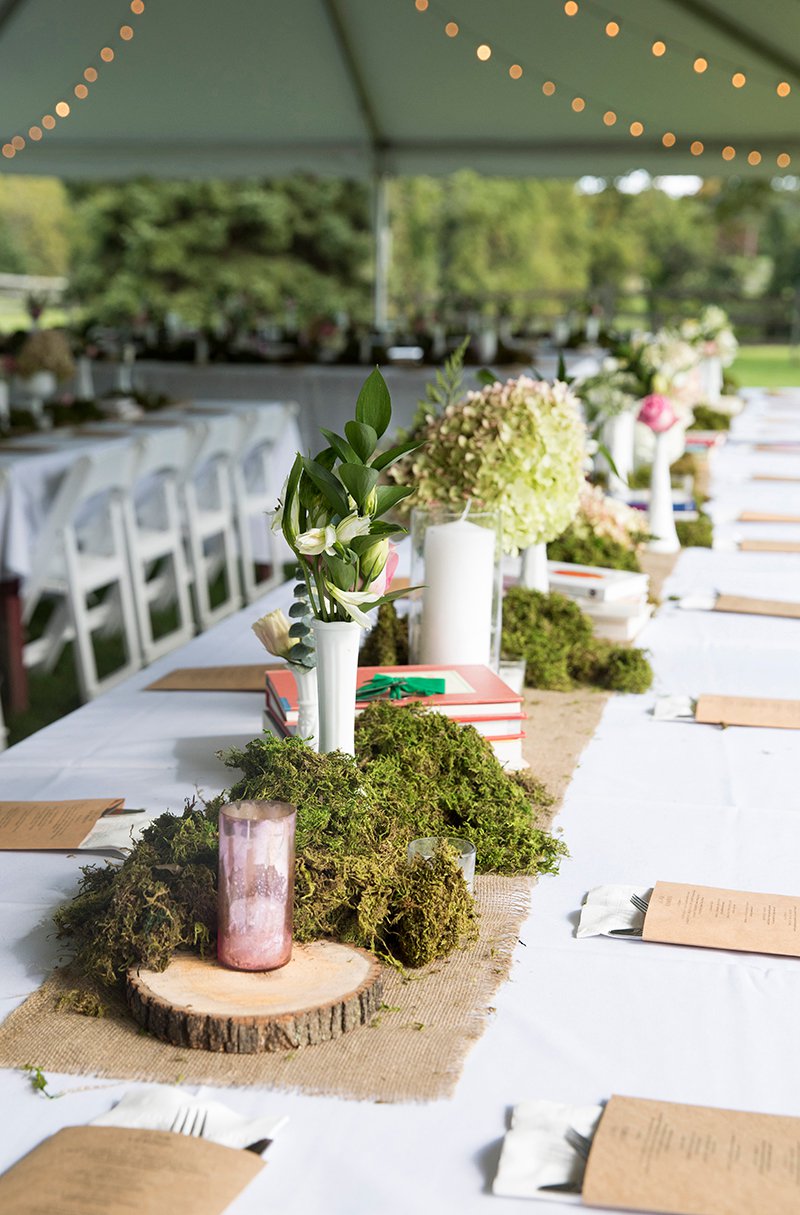 Wedding reception long table with wood, burlap, moss and greenery centerpieces