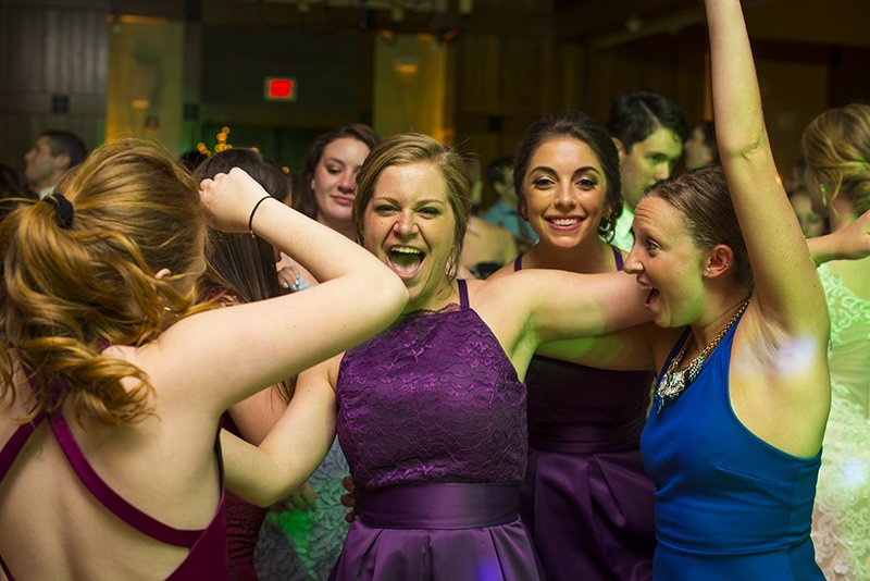 Bridesmaids having fun on dance floor