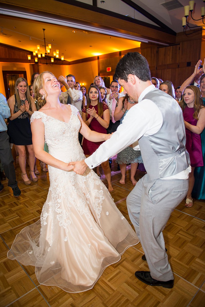 Bride and groom dancing at a wedding reception