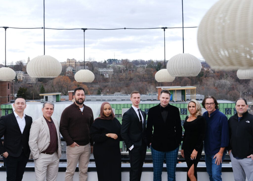 Garett Vassel with colleagues and retail tenants of The Commodore in Easton