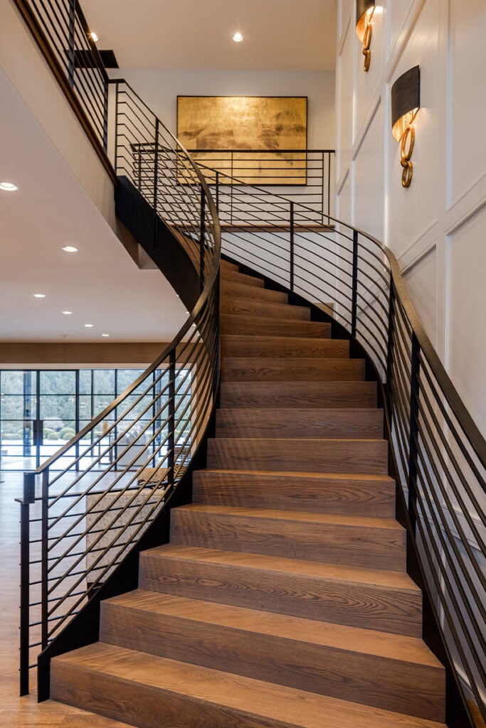 A dramatic curved staircase in an Upper Saucon house