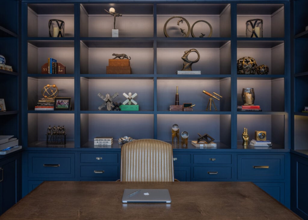 Blue shelving behind a desk in an Upper Saucon house