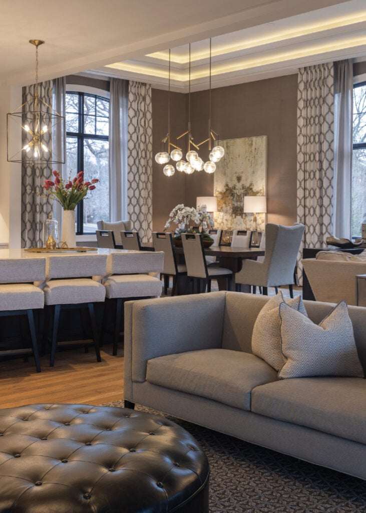 The seating area and kitchen lead into the dining room in an Upper Saucon house